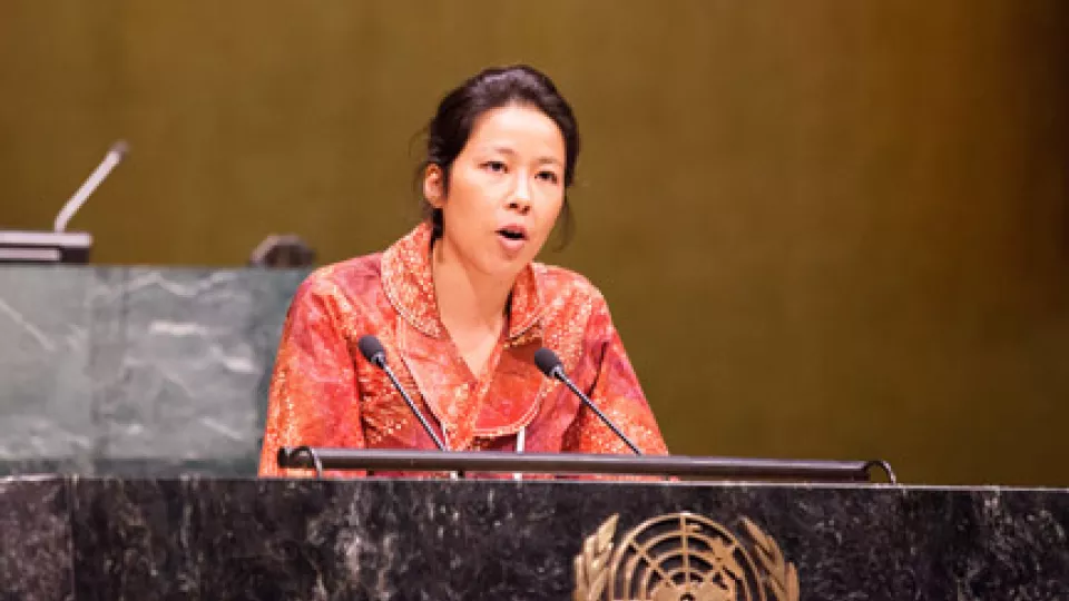 Likki Lee speaking in front of the General Assembly, at the UN headquarters in NYC