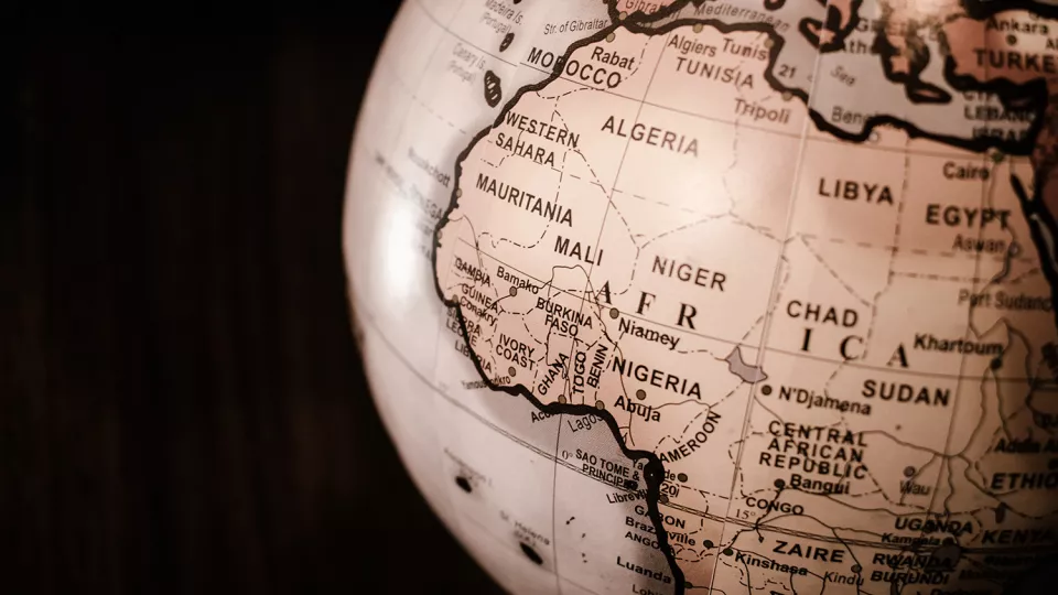 A globe with the map of Africa visible 