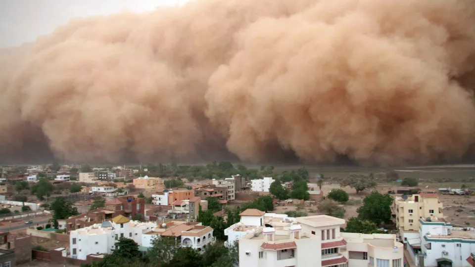 Dust storms over village