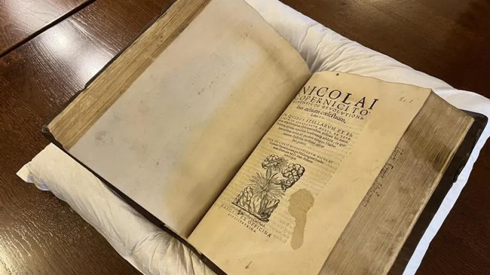 The Copernicus book opened up on a table