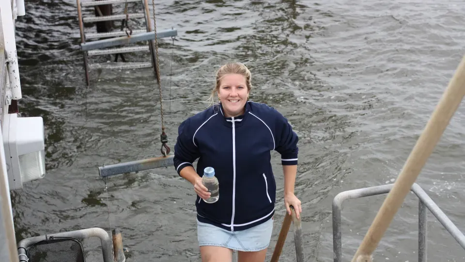 Water sample taken by the sea by a researcher