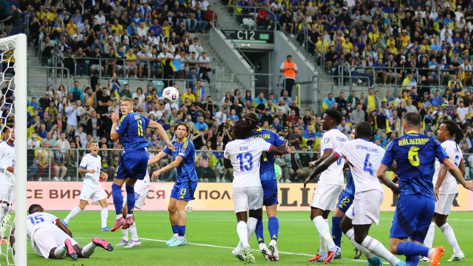 Ukraine and France playing a football match