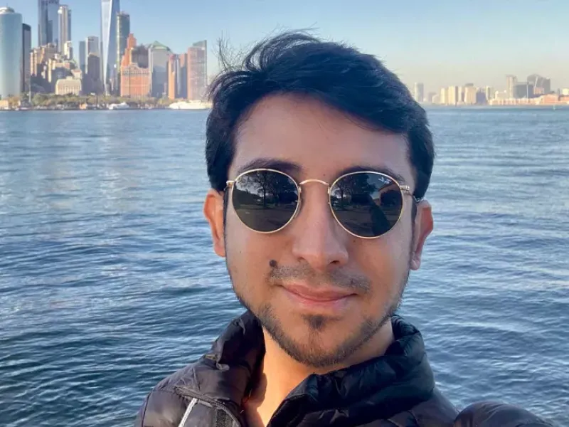 Portrait of a man with a city skyline in the background. Photo.