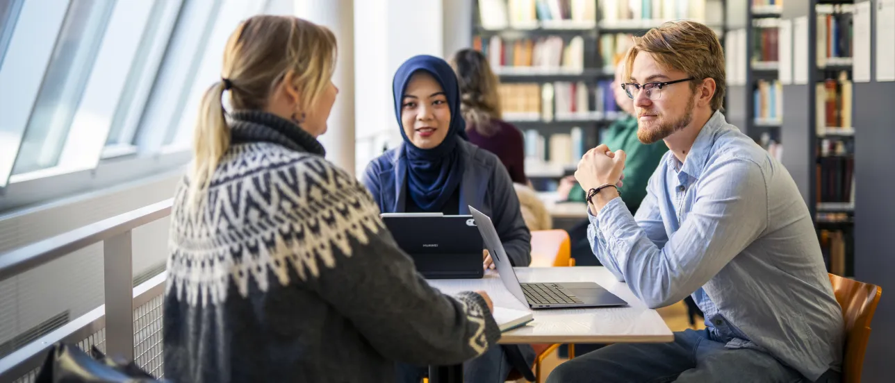 Students in the library at LUX.