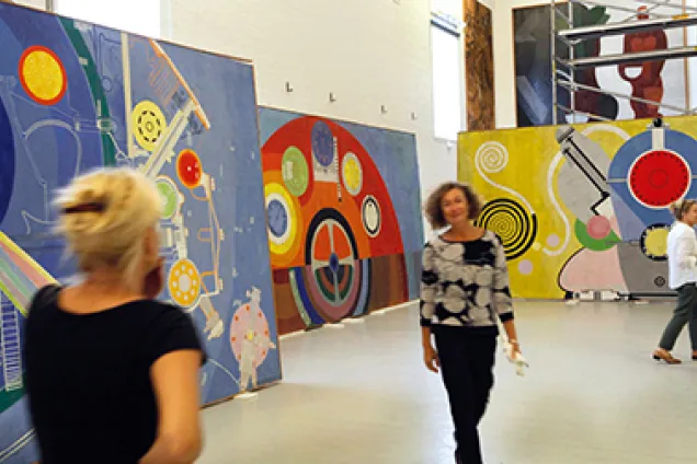 People admiring colourful art works at Skissernas Museum. Photo.