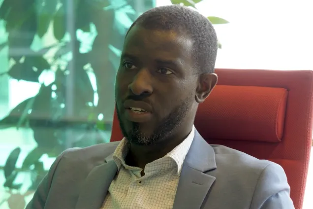 A still photo of the programme director Benedict. Photo.