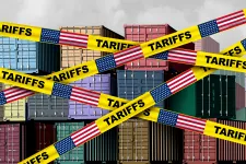 Image of containers overlaid with a yellow tape with American flags and the word "Tariffs".
