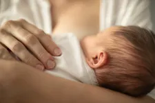 A woman breastfeeding a child. Photo: iStock