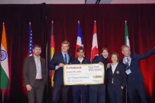 Yes! We did it! Happy winners with the prize cheque. Photo: Marcel Mallach