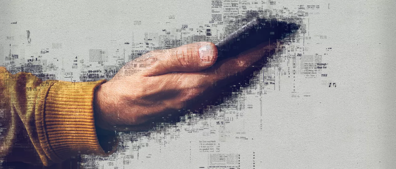 A graphic of a hand holding a phone