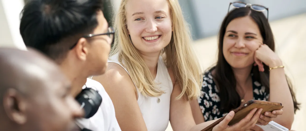 Students smiling. Photo.