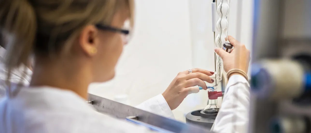 Photo. Student working in fume hood.