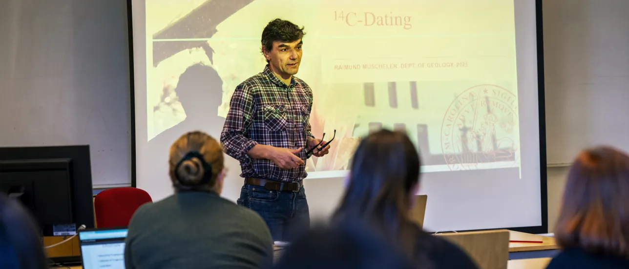 A teacher is giving a lecture.