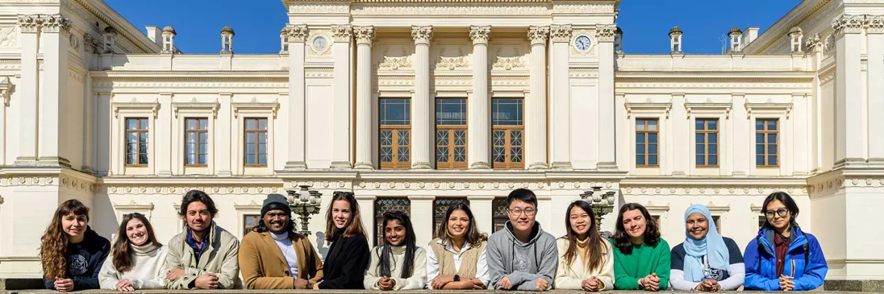 The Main University Building with students in front of it. Photo.