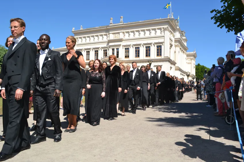The doctoral procession from the Main University Building to the Cathedral