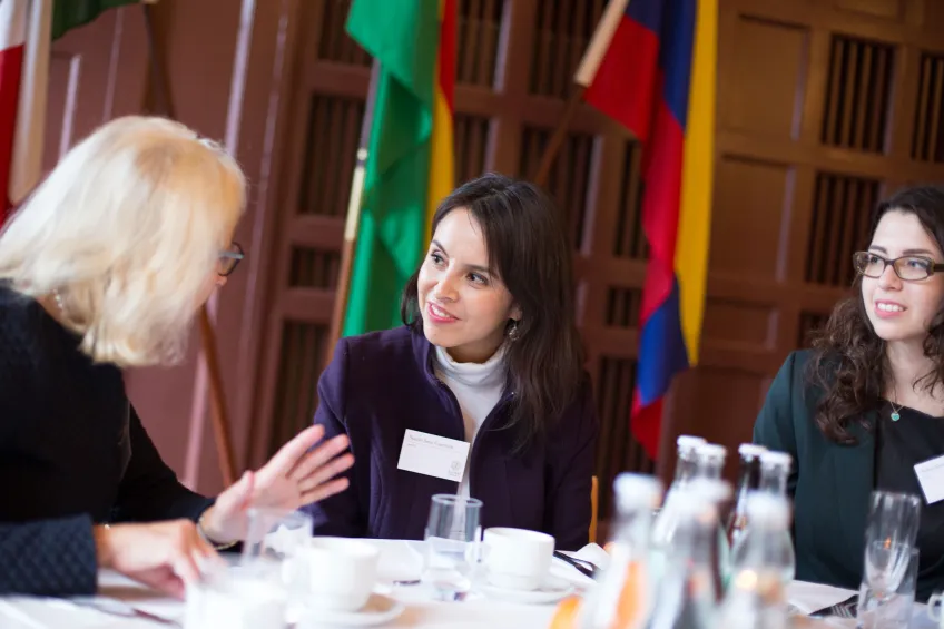 LUGS scholarship receivers having dinner and talking to a donor at the annual scholarship ceremony