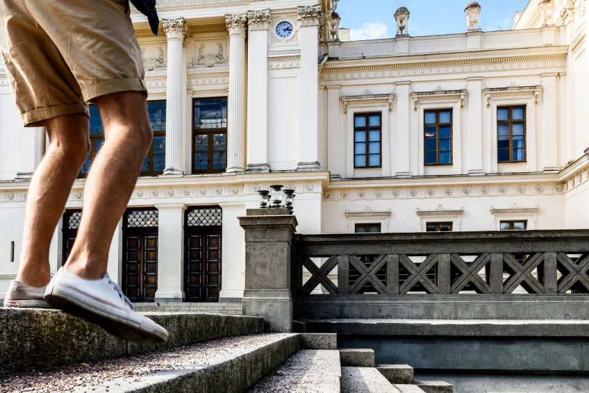 Legs at the steps of the Main University Building