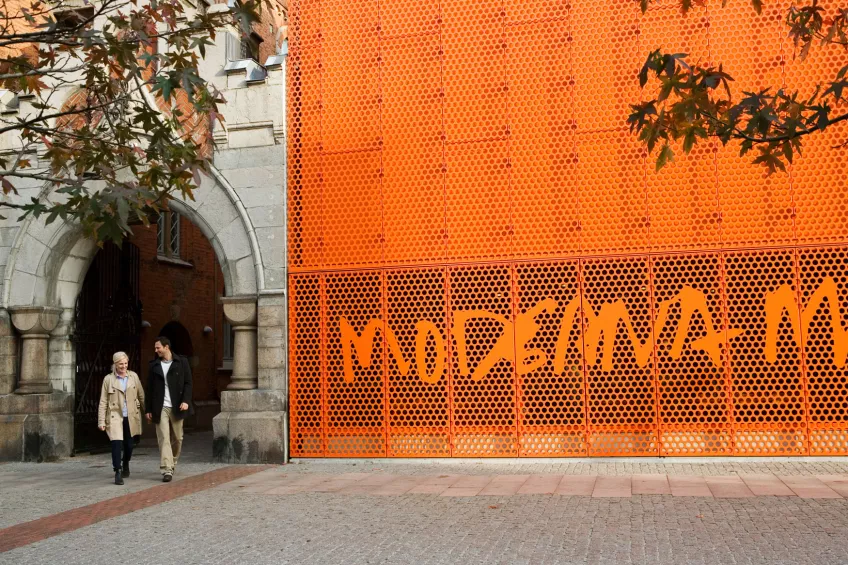 The orange facade of the Modern Art Museum in Malmö