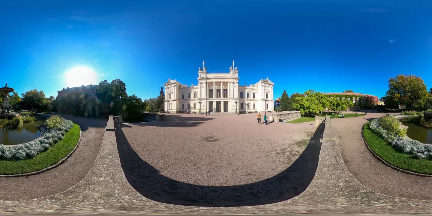 A 360 image of the Main University Building against a blue sky in early autumn