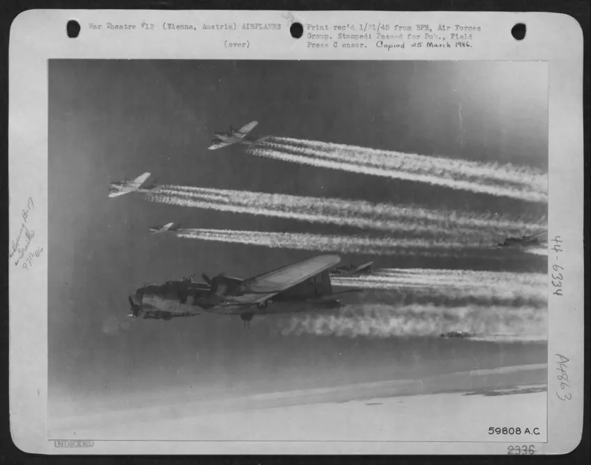 A B-17 flies over Vienna in black-and-white photo