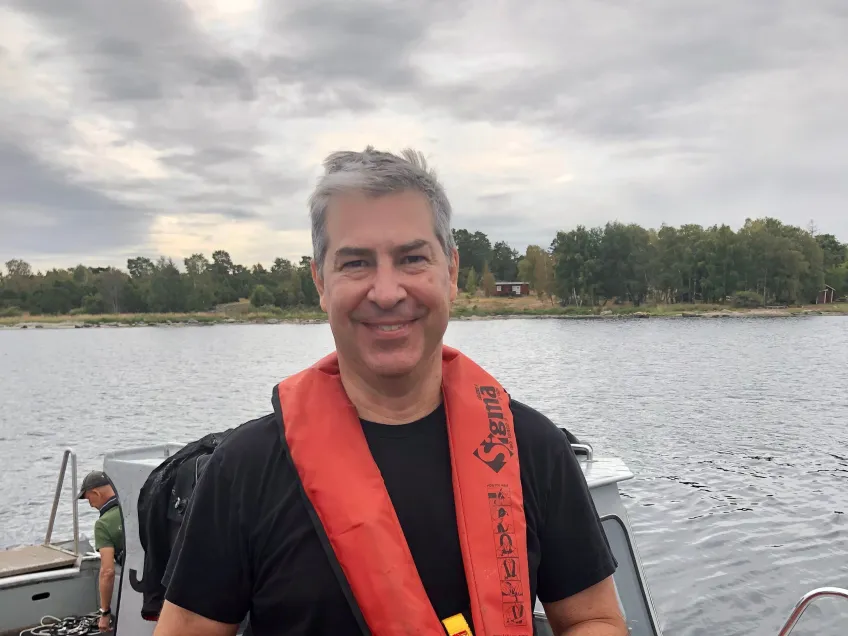 Brendan Foley in front of the sea