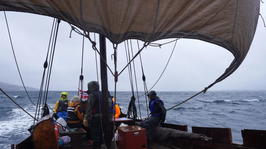 Crew on the ship in rough weather