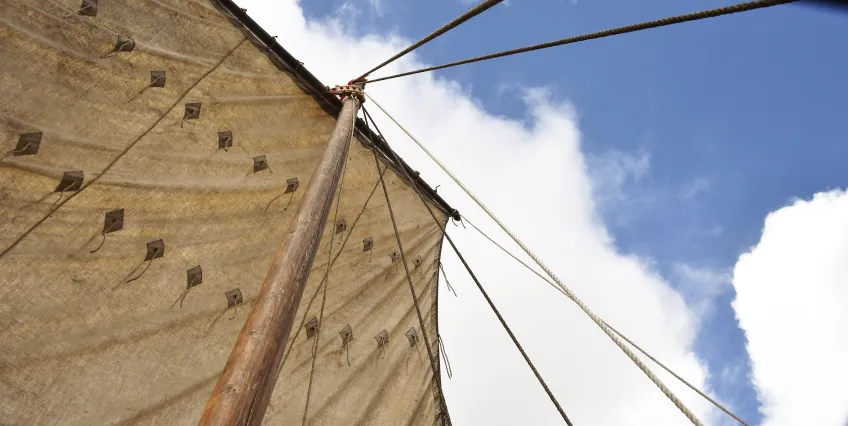 Blue skies and sail of the ship