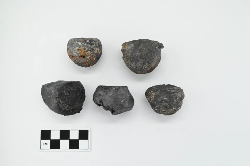 Five flattened shot, possibly evidence of the explosion that sank Gribshunden in 1495. Image: Morgan Olsson, Blekinge Museum.