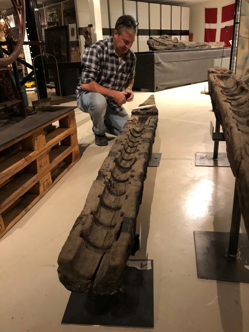 Brendan Foley inspecting a gun bed