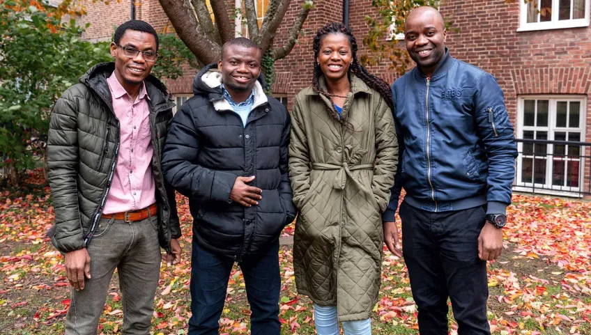Four African students in Lund. Photo.