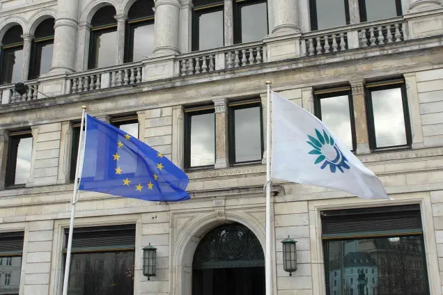 Building with EU flag in front of it