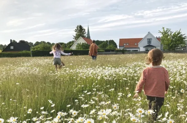 Child in field of grass